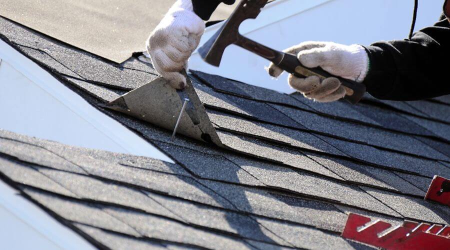Expert tile roof repair services in Latham, IL